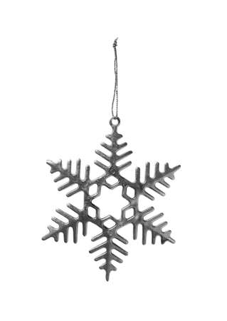 Christmas silver decorative snowflake hanging on silver glittering string isolated on white backgroundの写真素材