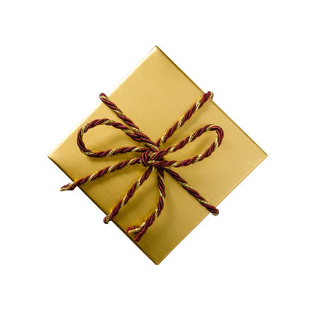 Golden gift box with red and gold cord rope ribbon isolated on white background, top viewの写真素材