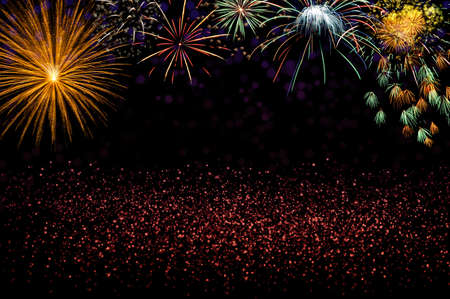 Abstract red glitter background with colorful fireworks. Christmas and New year holiday concept