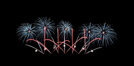 Beautiful fireworks display isolated on black background for celebration and anniversaryの写真素材