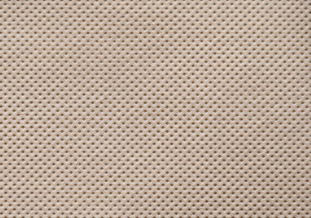 Light brown nonwoven or spunbond fabric texture backgroundの写真素材