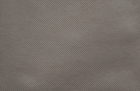 Brown nonwoven or spunbond fabric texture backgroundの写真素材