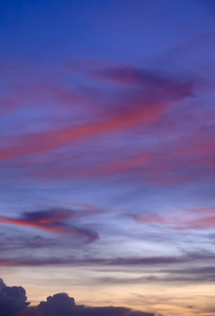 Dramatic sunset sky and clouds at twilight skyline backgroundの写真素材