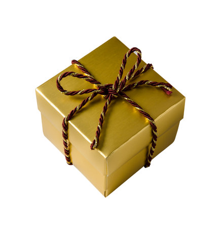 Golden gift box with red and gold cord rope ribbon isolated on white backgroundの写真素材