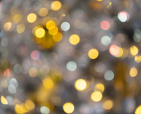Abstract background of blurred bokeh colorful lights backgroundの写真素材