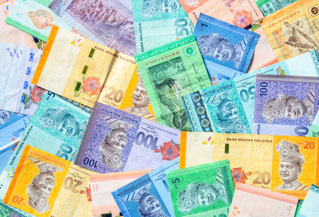 Malaysia currency of Malaysian ringgit banknotes background. Paper money of one, five, ten, twenty,...