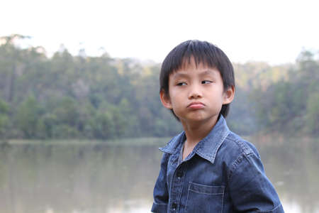 I don't like it kid face expressionの写真素材