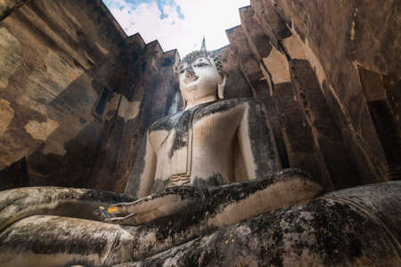 Phra Ajana, the big Buddhist statue at Wat Si Chum, Sukhothai Historical Park, Thailandのeditorial素材
