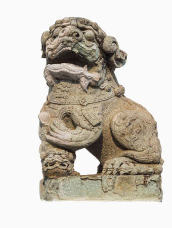 Chinese lion carved out of rock isolated with white background from Wat Phra Kaewの写真素材