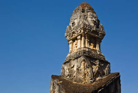 Khmer style statue at top of the gate of Si Satchanalai Historical Parkの写真素材