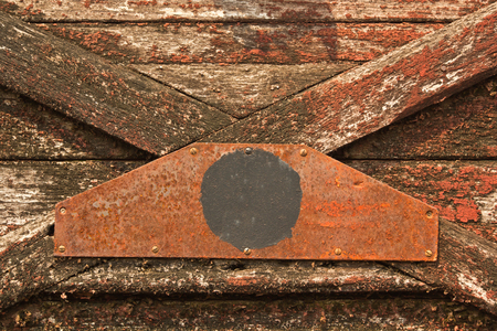 Old red carriage  with peeling  paint grunge  backgroundの写真素材