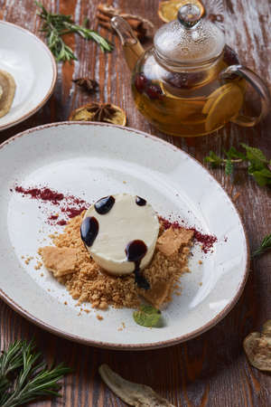 cheesecake with different toppings on wooden table. Dessert for breakfastの写真素材