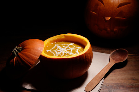pumkin soup on the wooden tableの写真素材