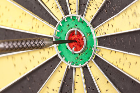 one dart in the midle of the boardの写真素材