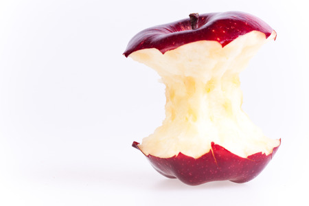 macro picture of bites apple in white の写真素材