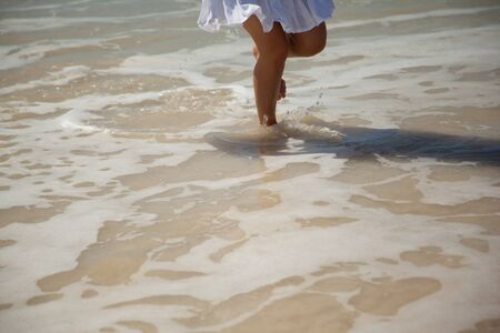 picture of womens leggs in the sea waterの写真素材