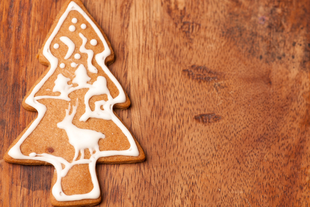 Christmas tree gingerbread cookie with white frostingの写真素材