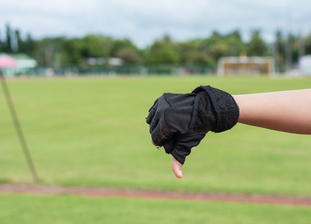 bad hand with sport gloves for say Goodの写真素材