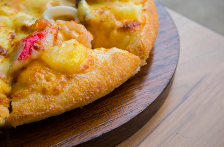 Close up of seafood pizza at italian restaurant.の写真素材