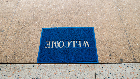 welcome carpet at the door texture backgroundの写真素材