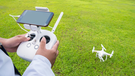 Hand holding on remote for Control drone 