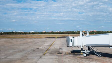 Jet bridge on run way in airportの写真素材
