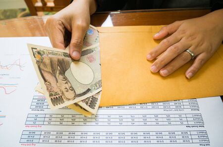 Statement report with money in financial concept.の写真素材