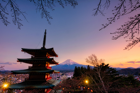 Chureito Pagoda in twilight with fuji mountain and sakura tree frame at sunset time.のeditorial素材