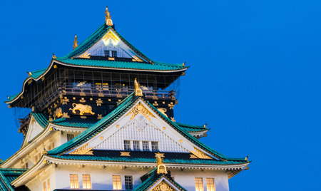 Osaka castle light up on night time wuth blue sky bavkgroundのeditorial素材