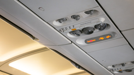 Group of Air control knobs,light for Belt warning signals and Non-smoking on the planeの写真素材