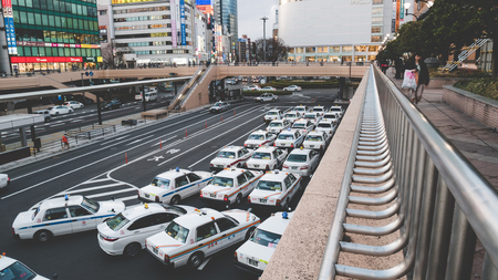 SENDAI , JAPAN - APRIL 12, 2017 A group of Taxi waiting passengers in Sendai stationのeditorial素材