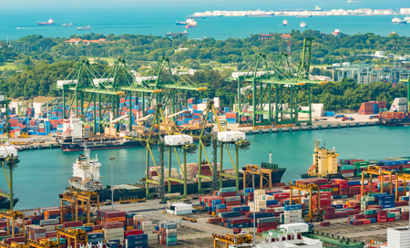 SINGAPORE MAR 2018 : Big cargo port in Singapore The center of the ship delivery in Southwest Asia. Every day a cargo ship is delivered to the destination Making business value in Singaporeのeditorial素材