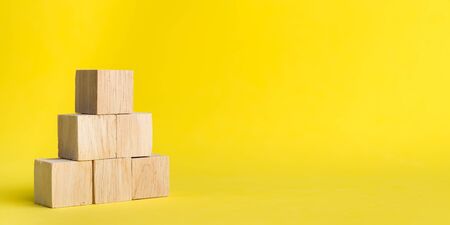 Banner Group of wood stack in human resource management or politics concepts,Teamwork Success Leadership Business Progress, Competition on yellow backgrond and copy spaceの写真素材