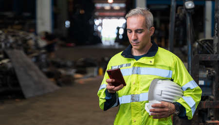 The chief engineer is using his phone and drinking coffee during the break. Lazy workers stop...