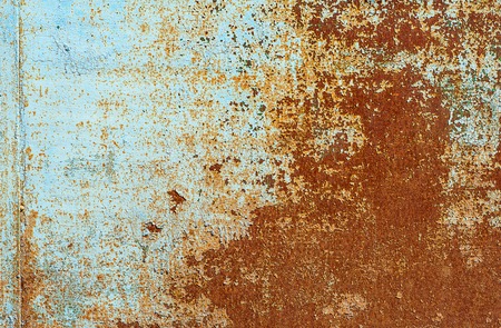 Texture of old rusty metal, painted white which becames orange from rust. Horizontal texture of...