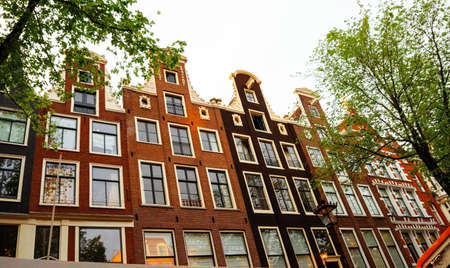 Beautiful views of facade of ancient buildings of Amsterdam - June 2019 Netherlandの写真素材
