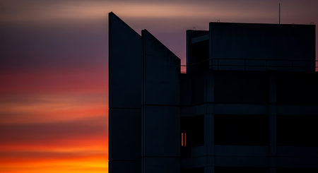Silhouette of skyscrapers at sunset in the city.の素材