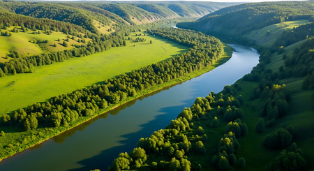 Aerial view of beautiful waterfall in green forest. Nature landscape backgroundの素材