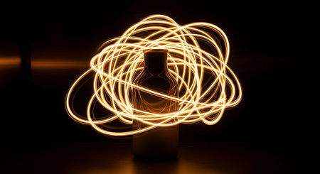 A bottle of wine on a dark background with a light trail.の素材