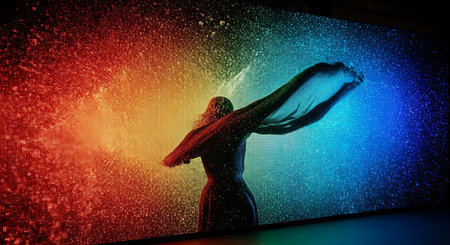 Silhouette of a woman with a pillow against a colorful backgroundの素材