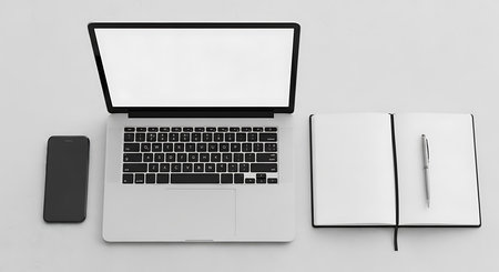 Laptop, notebook and smartphone on white background. 3d rendering.の素材
