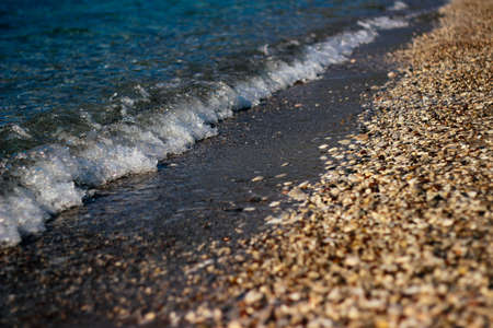 sea coast, beach on the seashore. crystal clear water