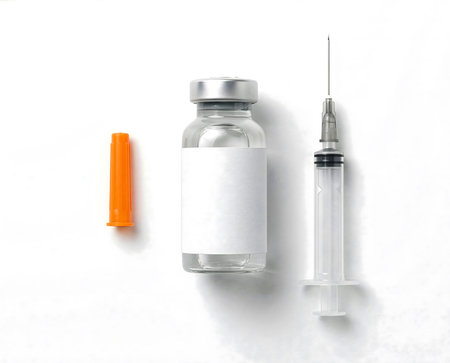 Easter cake with icing and colored eggs on a wooden stand.の素材