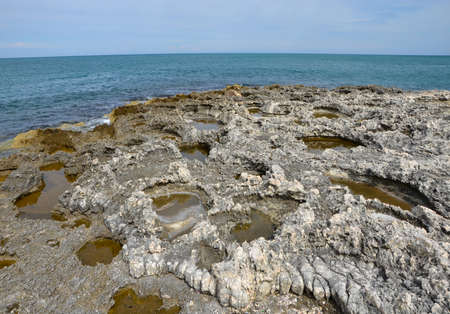 Dangerous surface of the rocky coast, Italy