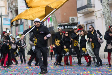 Vilanova i la Geltrú / Spain - February, 11, 2018: Comparsas groups dancing in "War of candies"のeditorial素材