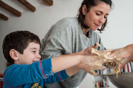 Family making cookies at homeの写真素材