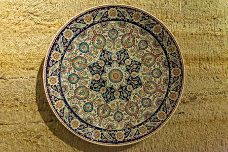 Ceramic plate with ornaments in the museum