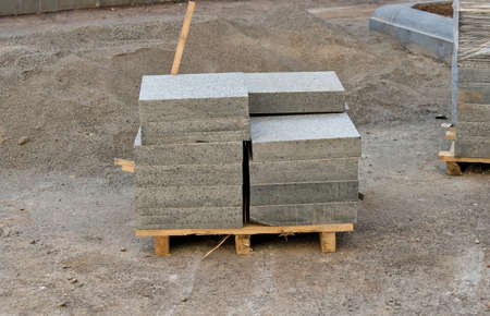 Bunch of marble slabs at the construction site of the future pavementの写真素材