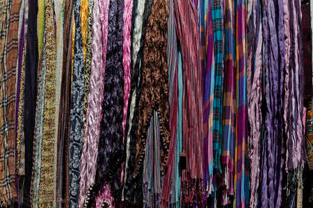 Colorful shawls and scarves in the marketの写真素材