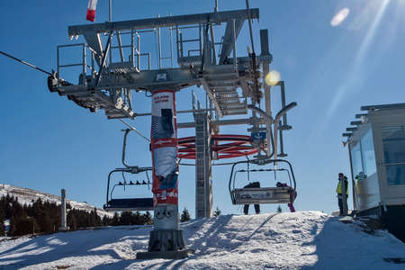 Kopaonik, Serbia - February 05, 2011: Ski lift on the mountain with skiersのeditorial素材